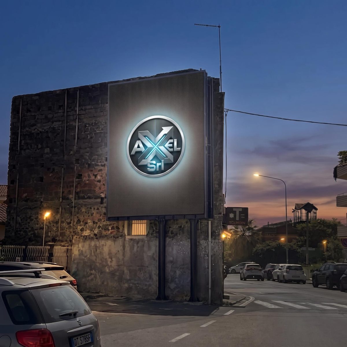 Il LED wall di Via Leucatia acceso all'imbrunire, con il logo Axel S.r.l. sullo schermo